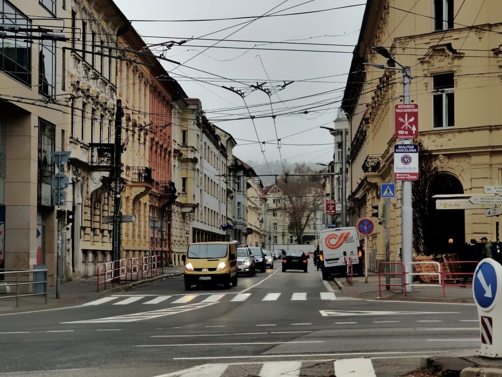 Streets of Bratislava: Entangled wires, dull colours, and empty sidewalks